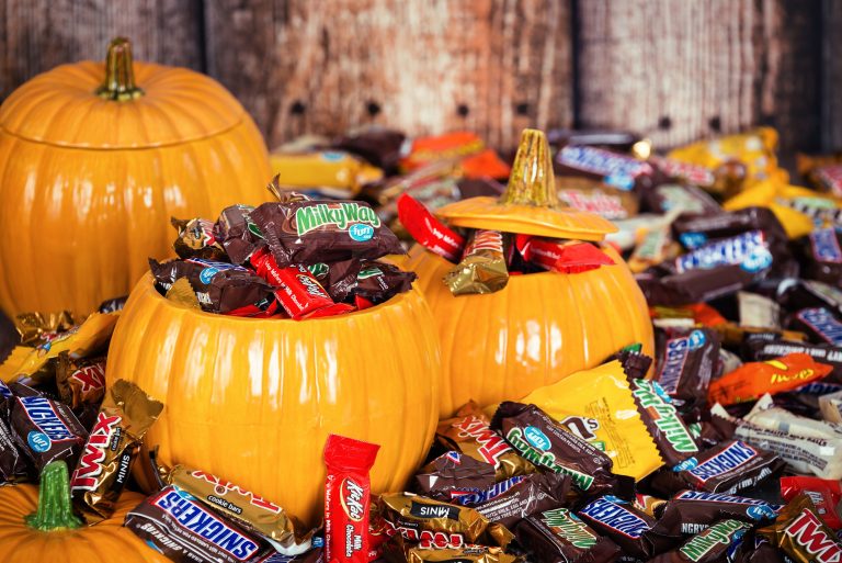 decorative-pumpkins-filled-with-halloween-candy-royalty-free-image-612816962-1564521118